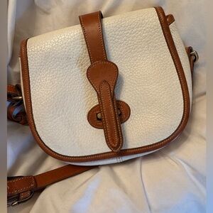 Vintage Dooney&Burke purse white with camel trim.